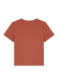 T-shirt à manches courtes et col rond de couleur terracotta. Tissu doux au toucher lisse, avec un dos uni et un ourlet droit.