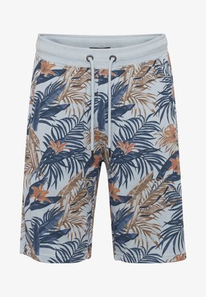 Herre shorts i lyseblå bomuld med et tropisk blad- og blomsterdesign i mørkeblå og jordnære nuancer. Elastisk talje med snoretræk.