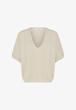 Beige lyhythihainen neulepaita, jossa V-aukko ja hienovarainen pystysuuntainen silmäkuvio, väljähkö malli ja resorireuna.