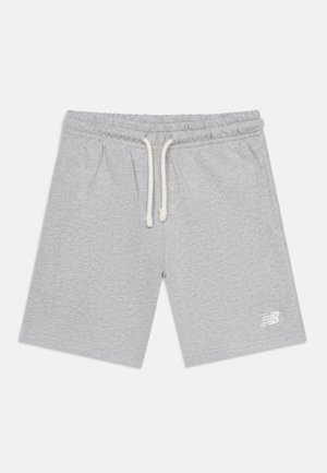 Lysegrå treningsshorts med elastisk midjebånd og hvit snor, med en liten hvit "NB"-logo på venstre ben.