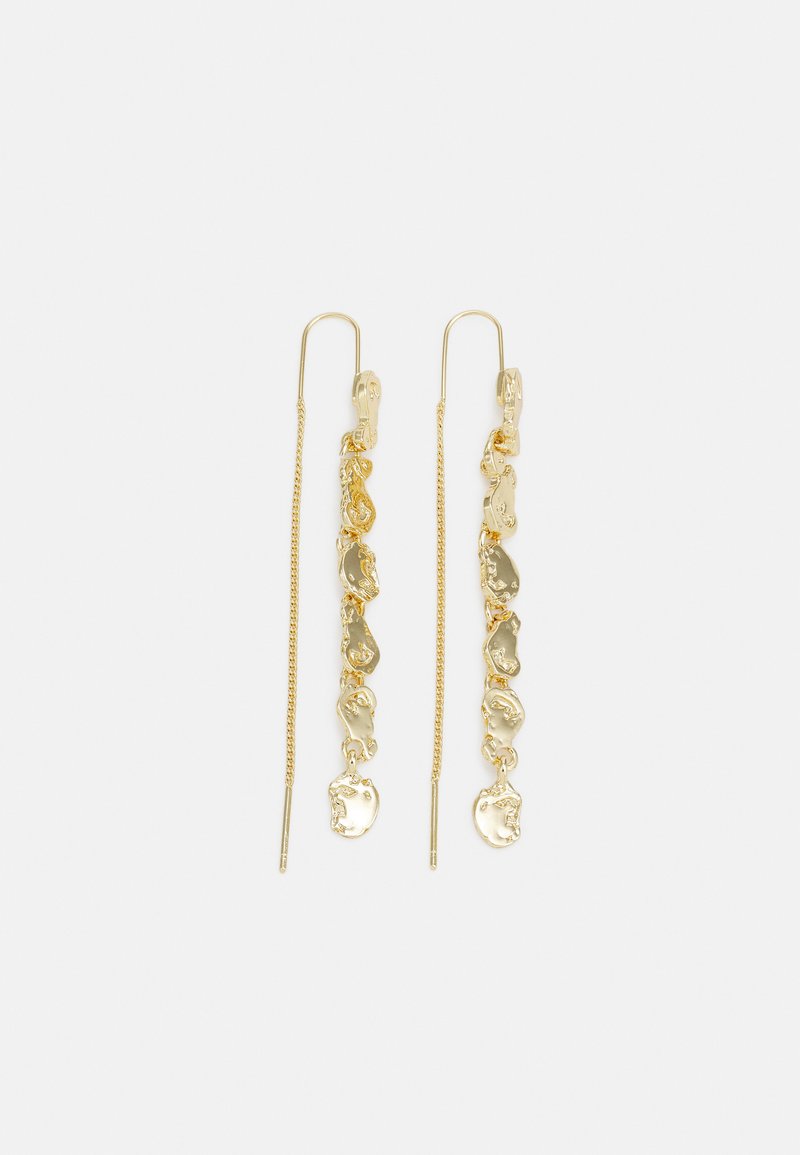 Boucles d'oreilles en métal doré avec un design de chaîne ondulée, présentant des maillons ovales lisses et texturés ainsi que des crochets fins et droits pour l'attache.