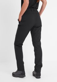 TOG24 SILSDEN - Trousers - black