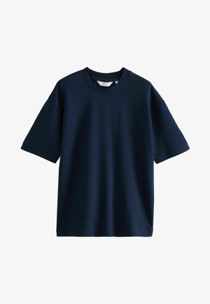 Mørkeblå bomulds t-shirt med afslappet pasform, rund halsudskæring og korte ærmer. Glat tekstur og enkelt design uden synlige mønstre.