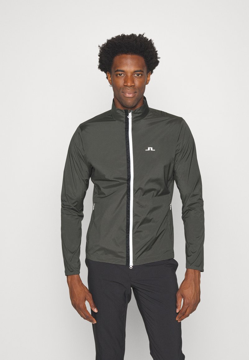 J.LINDEBERG Sports ASH LIGHT PACKABLE JACKET Hardshell jacket volcanic ash/grey Zalando.ie