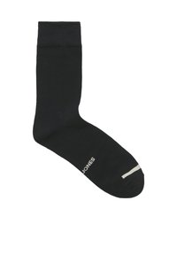 Zwarte katoenen sok met geribbelde boord, gladde textuur, logodetail en contrasterende witte streep bij de teen. Klassiek design met enkellengte.