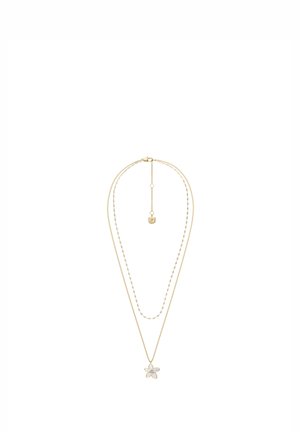 Collier chaîne en or à double couche avec un petit pendentif en forme de fleur, présentant des pétales de couleur claire et une gemme centrale.