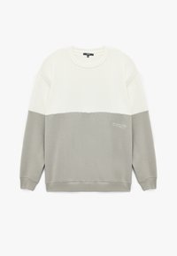 Crewneck sweatshirt in wit en lichtgrijs. Zachte stof met een gladde textuur. Kenmerkt een horizontaal kleurblokontwerp en borduursel detail op de zoom.