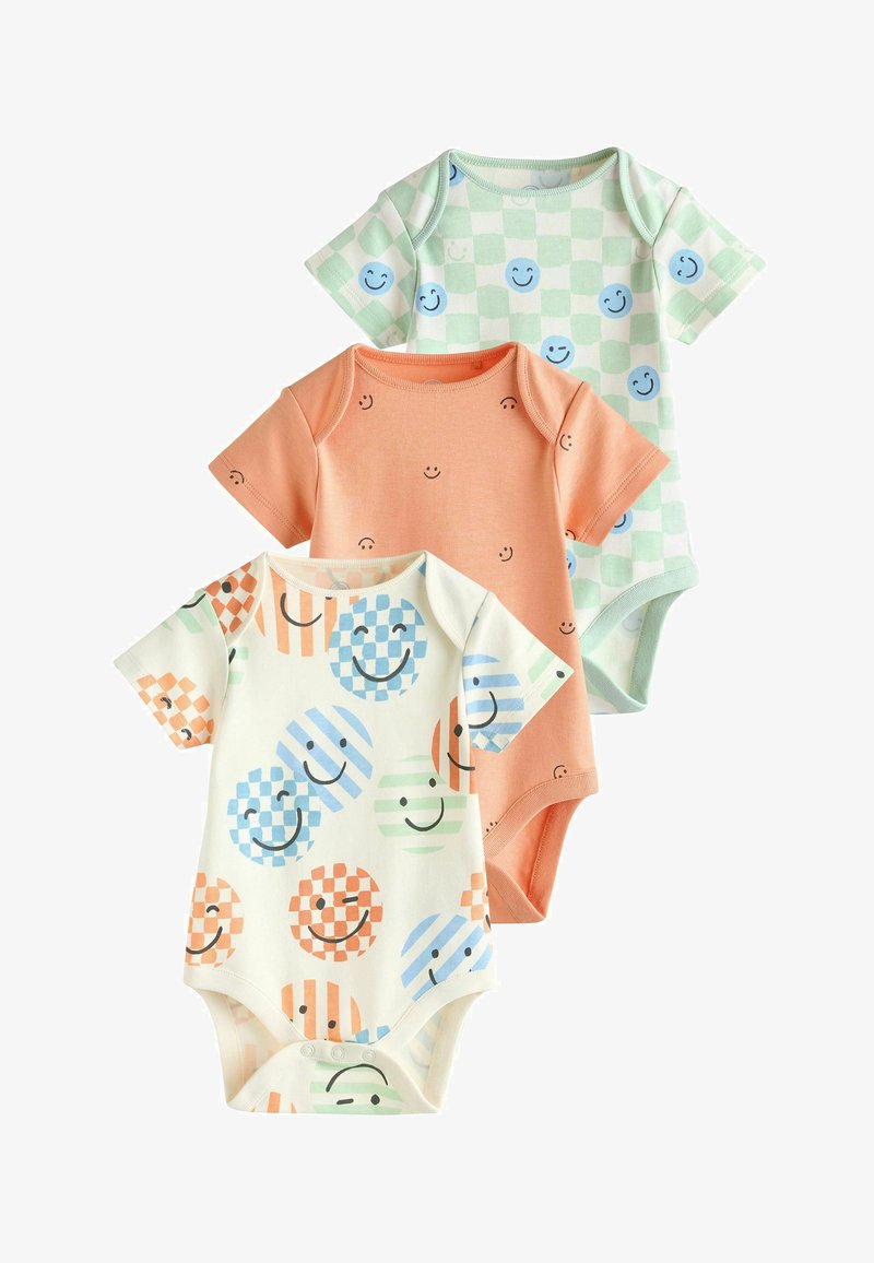 Tre kortærmede babybodystockings med smiley-ansigter, i pastelgrøn tern, ensfarvet fersken og flerfarvede cirkler på hvid.