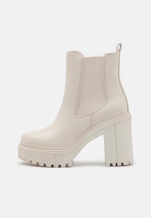 Højhælede støvletter - off-white