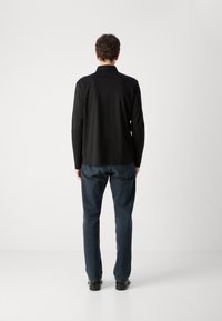 BOSS PALEY - Poloshirt - black