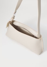 Calvin Klein EMBOSSED LOGO SHOULDER BAG - Borsa a mano - gray morn