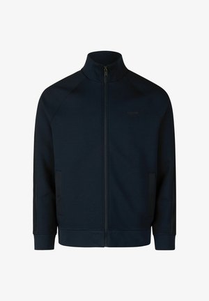 Donkerblauwe ritsjack met hoge kraag, gemaakt van gladde stof. Bevat raglanmouwen en gaasaccenten aan de zijkanten.