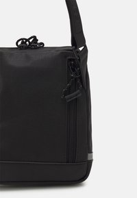 Jost BILLUND CYCLIST PRO SHOULDER BAG XS UNISEX - Borsa a tracolla - black