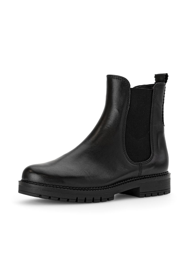 Bota de cuero negro hasta el tobillo con paneles laterales elásticos, un acabado suave, punta redonda y suela de goma resistente, con costuras a lo largo del borde.