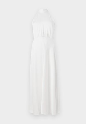White halter neck maxi dress with a fitted bodice, gathered waist, and flowing skirt. Smooth fabric with a subtle sheen.