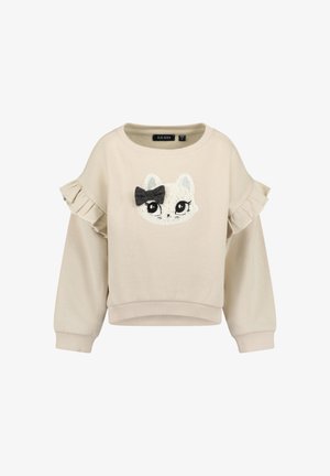Beige langærmet sweatshirt med flæsedetaljer på skuldrene og en hvid katteansigt-applikation med sort sløjfe foran.