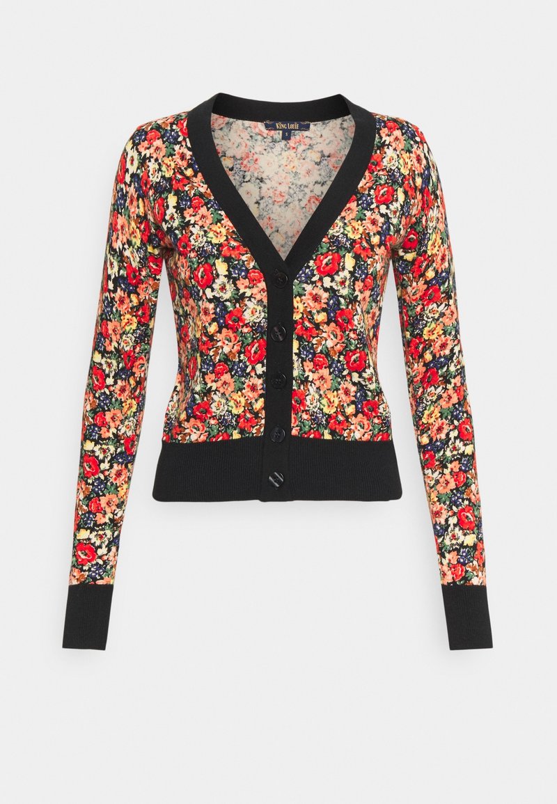 Cardigan à manches longues boutonné avec bordure noire et motif floral multicolore rouge, jaune et orange sur fond sombre.