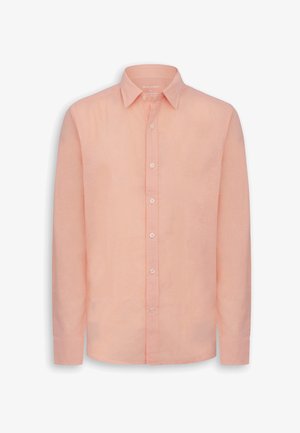 Chemise pour homme à manches longues, boutonnée, en pêche douce, avec un col classique et des boutons blancs sur le devant.
