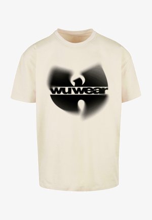 Cream-colored cotton t-shirt featuring a black graphic logo with a flame design and the text "wu wear" beneath it.