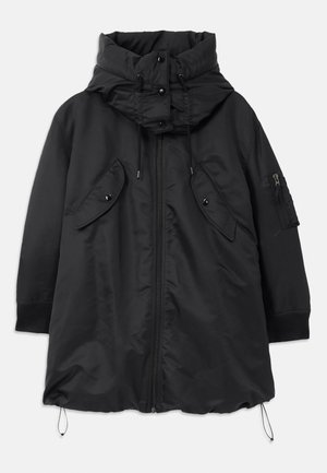 Black padded jacket with a high collar, front zipper, adjustable drawstrings, and side pockets. Features ribbed cuffs and texture contrast.