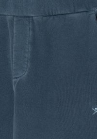 Hackett London Tepláky - dark denim blue
