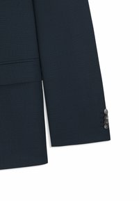 Marineblazer mit strukturiertem Muster, einreihigem Design und vier grauen Knöpfen an den Manschetten. Maßgeschneiderte Passform mit scharfen Revers.