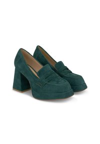 Mocassini con tacco alto in suede verde, con punta quadrata, dotati di dettaglio con cinturino e tacco a blocco. Texture liscia con una finitura in un colore solido.