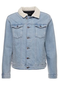 Vaaleansininen farkkutakki, jossa on pörröinen valkoinen kaulus, edessä napituskohu, kaksi rintataskua ja pitkät hihat. Rakenteellinen kangas, jossa on ompeluyksityiskohtia.