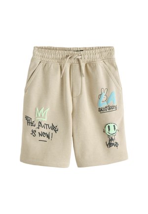 Beżowe szorty z elastyczną talią i przednimi kieszeniami, tekst w stylu graffiti i symbole, w tym "Przyszłość jest teraz!" oraz uśmiechnięta buźka z napisem "LA Vibes."