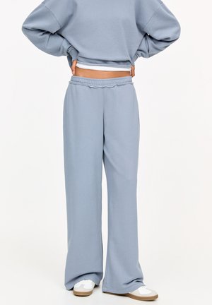 WITH FRAYED WAIST  - Pantalon de survêtement - blue