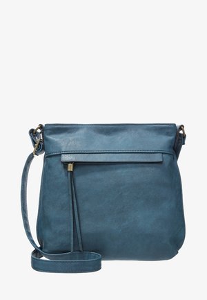 Petit sac bandoulière en cuir bleu avec sangle réglable et pompon décoratif sur la poche zippée avant.