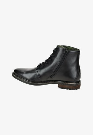 Schwarze Leder-Stiefelette mit Schnürung vorne und seitlichem Reißverschluss. Hat ein strukturiertes grünes Futter und einen gestapelten Holzabsatz.
