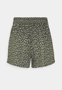 Shorts verts à motifs avec une taille élastique, ornés de formes blanches allongées sur l'ensemble du tissu et d'une coupe décontractée.