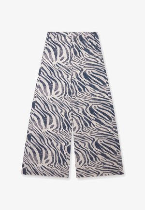 Pantaloni a gamba larga con fantasia zebra bianco e nero, vita elastica e tessuto leggermente strutturato.