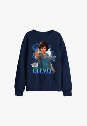 Navy sweatshirt with graphic of Eleven from Stranger Things reaching out, wearing overalls, text "Friends Help Friends" and "Eleven."