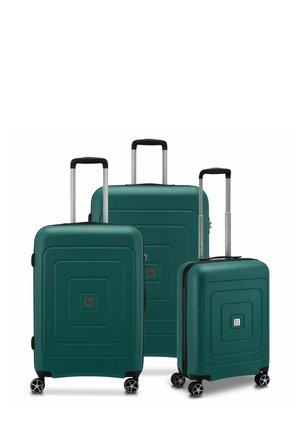 Three hard-shell suitcases in dark teal with a textured geometric design. Features extendable handles and spinner wheels for mobility.