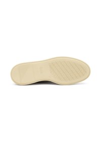 Suela de zapato con un material de goma de color beige claro, que presenta una textura con patrón y un detalle de marca. Bordes curvados y un diseño plano.