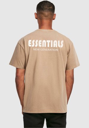 Brown cotton t-shirt with short sleeves, featuring white text "ESSENTIALS NEW GENERATION" across the back. Simple design with a relaxed fit.