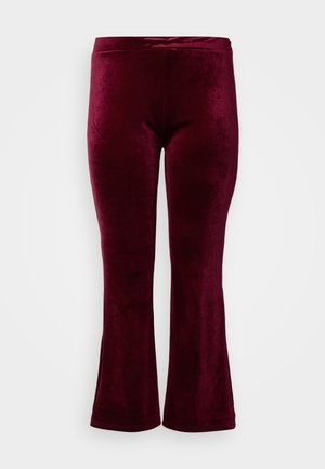 Legginsy dzwony w kolorze bordowym, wykonane z miękkiego, teksturowanego aksamitu, z gładkim pasem i dopasowaną sylwetką do kolan.