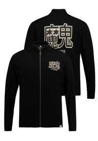 Sort zip-up jakke lavet af strikket stof. Forsiden har et lille logo; bagsiden har stor grafisk tekst i beige, ribbede krave og manchetter.