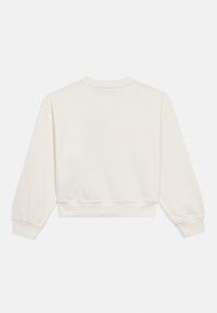 Sweatshirt de gola redonda em off-white, com mangas compridas e design cropped. Tecido macio com punhos e barra canelados. Sem detalhes destacados.