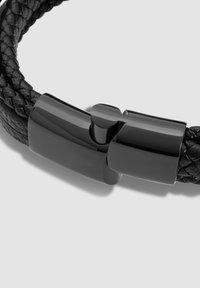 Black braided leather bracelet with a glossy black metal clasp, featuring a smooth, rounded design and a seamless connection at the closure.