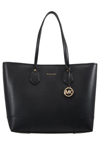 Sac cabas en cuir noir à design structuré, avec deux anses pour l'épaule, ferrures dorées, logo « MICHAEL KORS » et un pendentif MK suspendu.