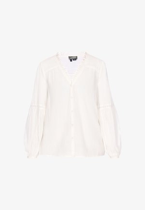 Blouse blanche avec un décolleté en V, boutonnée à l'avant, et col à volants. Présente des manches longues bouffantes et de délicats accents en dentelle. Texture de tissu douce.