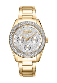 Orologio dorato con quadrante argento testurizzato scintillante, tre sottodial e una lunetta accentuata da cristalli. Bracciale a maglie metalliche. Marca: DKNY.
