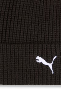 Black knit beanie with ribbed texture. Features a small white Puma logo on the side. Fabric appears thick and warm.