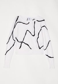 Pull court à manches longues blanc avec des lignes noires abstraites irrégulières formant un motif aléatoire sur le tissu.