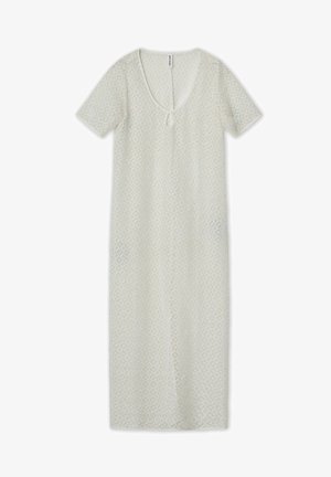 Rochie maxi din dantelă în alb murdar, cu mâneci scurte, decolteu adânc în V și închidere cu fundă. Prezintă un model geometric pe întreaga suprafață.