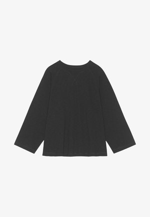 Tumši pelēks garām piedurknēm tops ar apaļu izgriezumu un brīvu piegriezumu. Iezīmē raglanu piedurknes un tekstūrētu kokvilnas maisījuma audumu.