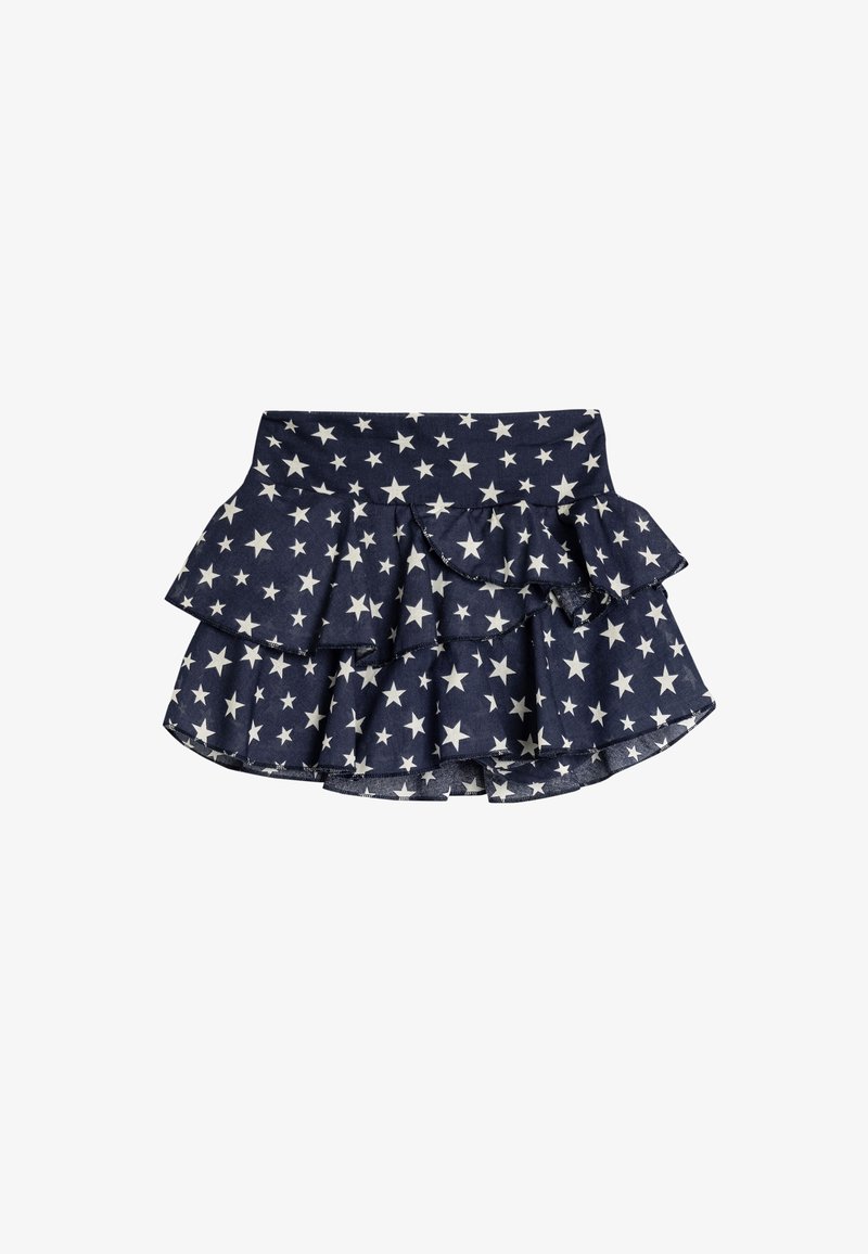 Jupe bleu marine à plusieurs couches avec motif d'étoiles blanches et détails de volants asymétriques.